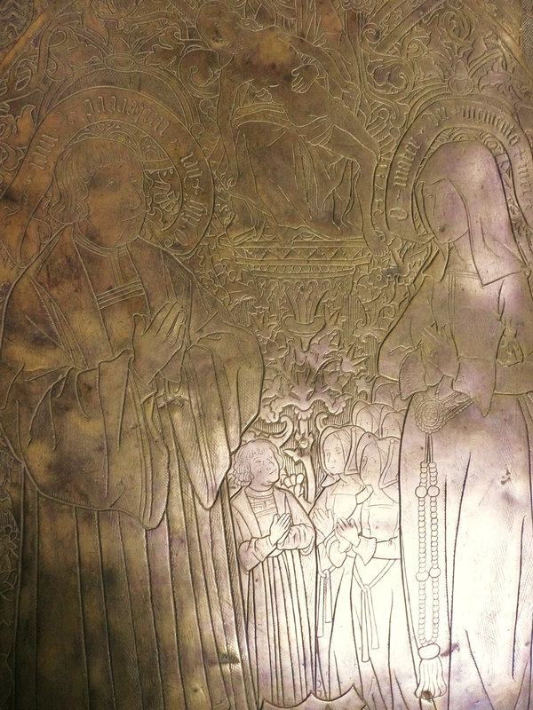all hallows barking, london,andrew evyngar, his wife, son and daughters pray to a pieta on this flemish brass of 1530
