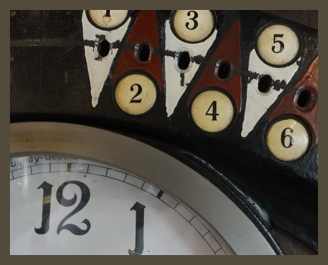 Detail of a time clock about 1900/Detail einer Stechuhr etwa um 1900