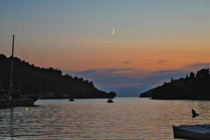 Sunset at the port in Vela Luca