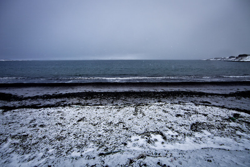 A beach and a snow storm