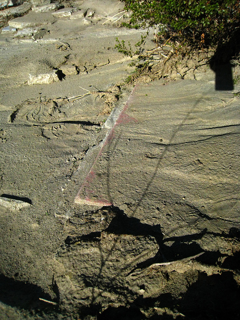 Corner of an old slab foundation exposed by the flood at Miracle Hill & Two