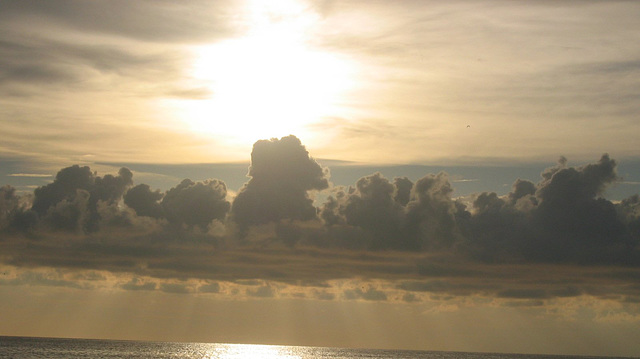 Puffs of clouds reaching for the sun...