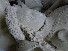 little munden church, herts.head resting on crested helmet of sir philip thornbury +1452. he wears what is probably a lancastrian livery collar, decorated with the letter S