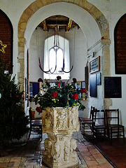 wissett church, suffolk,c15 font in front of the simple c11 tower arch