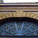 king's cross station, london,cast iron tympanum of the arch originally over the cab entrance to the railway station built 1851-2 by lewis cubitt