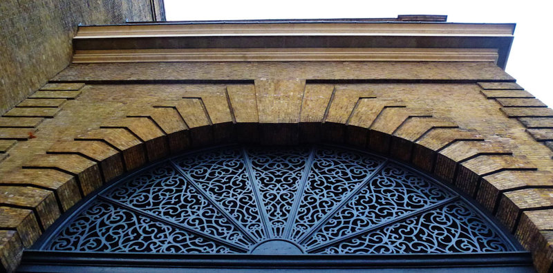 king's cross station, london,cast iron tympanum of the arch originally over the cab entrance to the railway station built 1851-2 by lewis cubitt