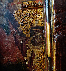 yaxley church, suffolk,detail of the raised gilded gesso background of one of the c16 screen panels, with incised patterns on the clothing too.