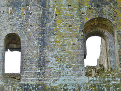 corfe castle,detail of the c12 first floor of the keep , with the tympanum of the ornate chapel doorway just visible in the left hand doorway leading into the annexe