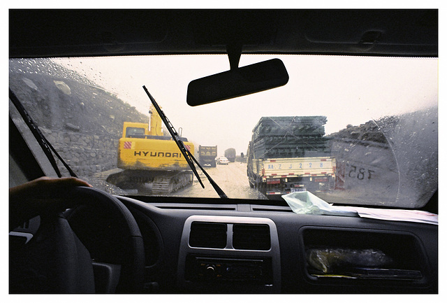 Leaving Tagong, road construction