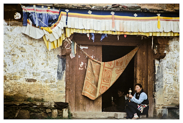 Lady with prayer wheel