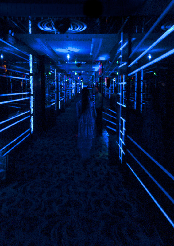 In the dark-lit halls of a Chinese Karaoke Night Club