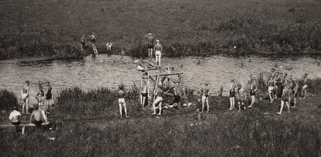 young soldiers enjoying a dip in the water