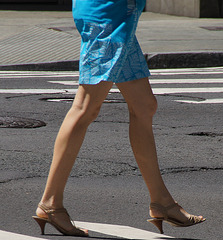 long legs crossing the street