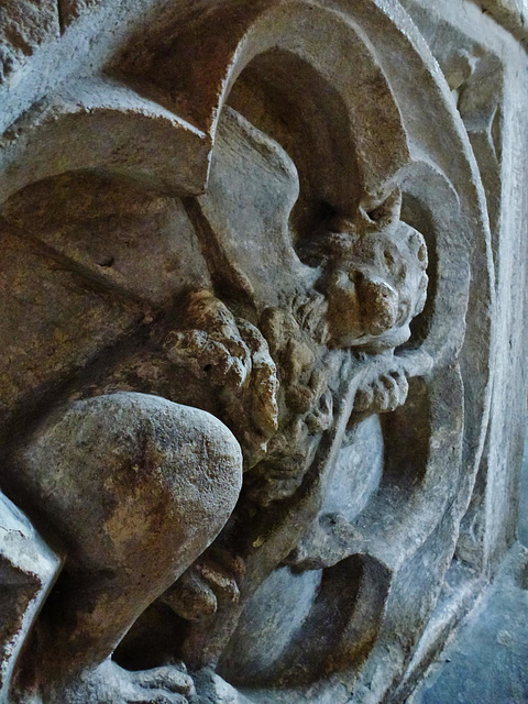 cogges church, oxon.lion evangelists symbol on side of early c14 chest tomb in north chapel