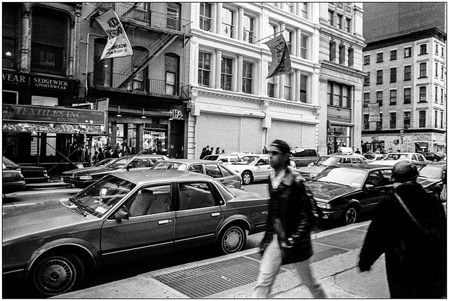 Walking on the street .