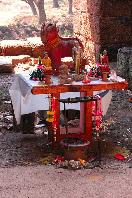 Sacrificial altar in front of the Buddha statue