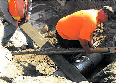 Repairing water line at Camino Campañero