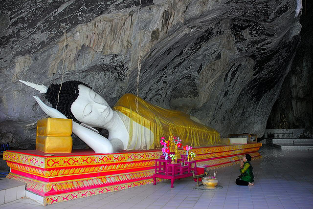 Meditation in front of a reclining Buddha