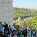 Tourists making their way up the challenging marble steps of the Propylaea.