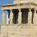 The porch of the Caryatids, or porch of the maidens, on the southwest corner of the Erechtheion.  These statues are exact replicas of the originals, five of which are in the Acropolis Museum and one in the British Museum.