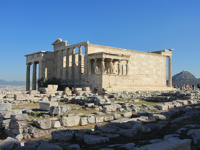 The Erechtheion, with the ruins of the old temple of Athena in the foreground, destroyed by the Persians in 480 BC.