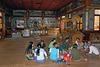 Burmese family enjoy a lunch pick nick on the floor