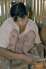 Intha woman doing pottery work