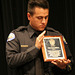 Officer Rene Olague with Plaque for Chief Williams (6445)