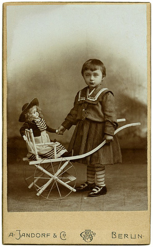 A Girl with Her Doll and Cart, Berlin