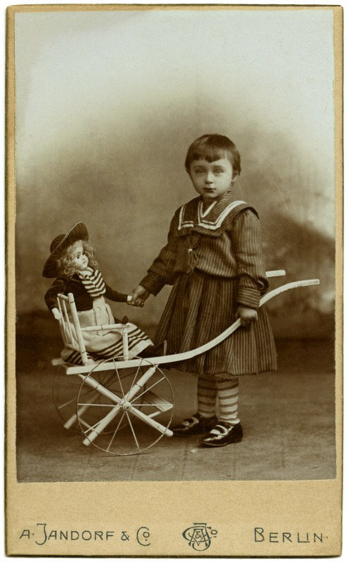 A Girl with Her Doll and Cart, Berlin