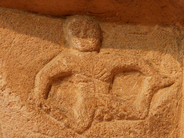 swell c.1130 exhibitionist figure, chancel capital