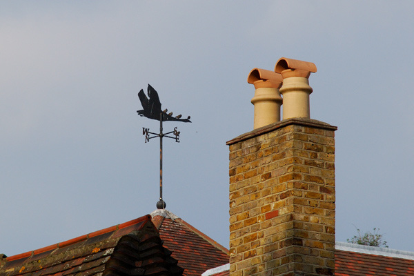 Birds on a weather vane