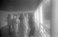 Sailors watch as the boats strain their moorings