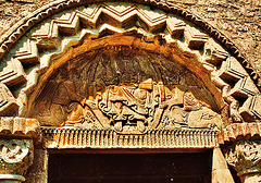 water stratford church, bucks,whilst showing some pre-conquest influences this is very obviously a norman tympanum; despite several authors' contentious claims.  it probably dates from the revived interest in earlier design that came about during the