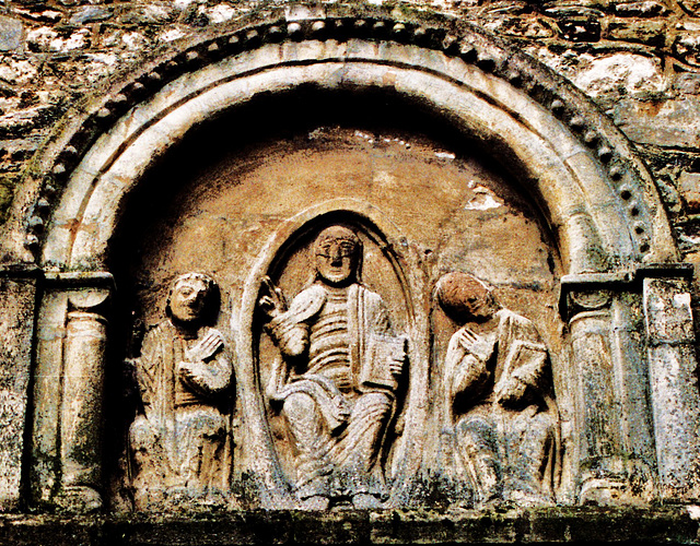 elstow abbey , beds 1140,a c12 norman panel of sculpture, with christ in a vesica between two apostles. unusual, as apparently not  a tympanum but an inhabited niche.