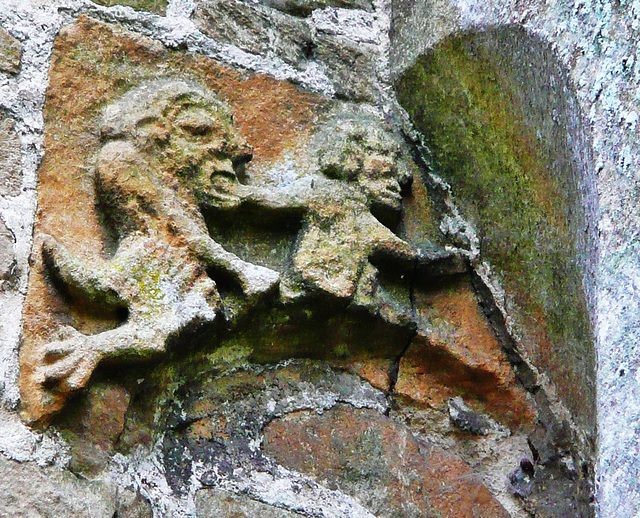 coln st.aldwyns  glos. devil window tympanum,such tympana over windows are rare, and all seem to belong to the end of the c11. the closest in style to this of which i am aware is tangmere in sussex. h