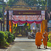 Monks enter the temple complex