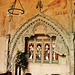 belchamp walter church, essex, john boutetort, c14 tomb canopy with square cut hole to cusps in line with tudor window. contemporary paintings cover the walls.c.1325