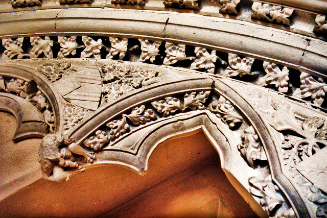 belchamp walter church, essex, john boutetort, c14 tomb canopy with square cut hole to cusps in line with tudor window. contemporary paintings cover the walls.c.1325