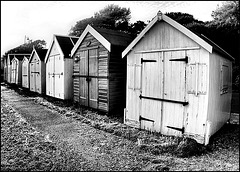 black n white beach huts