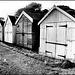 black n white beach huts