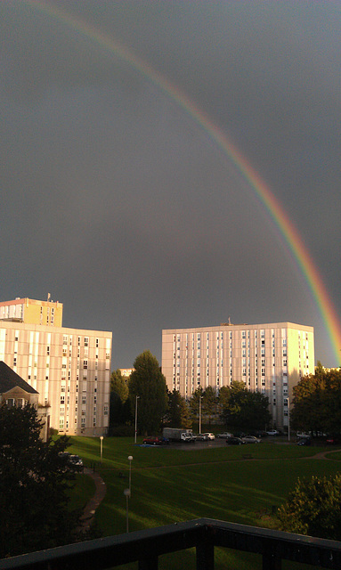 Superb rainbow over almost completely black sky