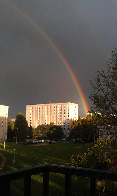 Superb rainbow over almost completely black sky