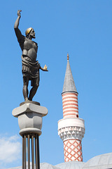 Roman statue and minaret