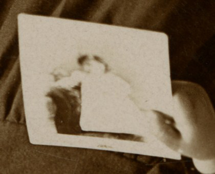 Girl Holding Photograph (Detail Showing Photograph)