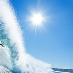 Surfer on Blue Ocean Wave
