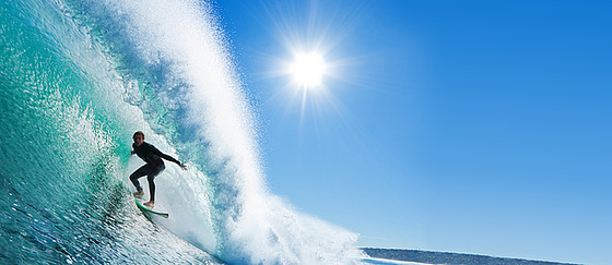 Surfer on Blue Ocean Wave