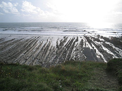 The long ribs of rocks at Welcome Mouth beach