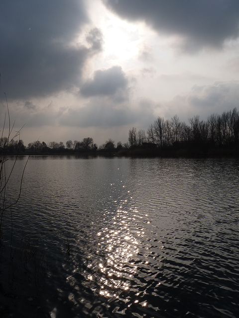 Wolkenlücke und Sonnenreflexionen