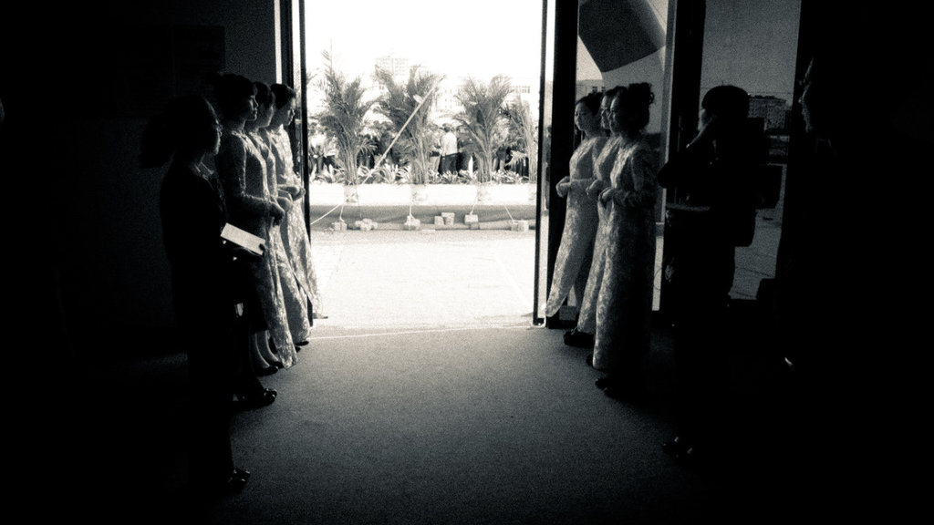 Welcome by a Qipao dressed girls